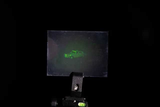 White light hologram of a model car from different viewing angles