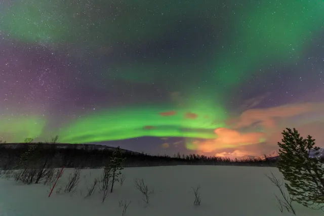 Northern lights in the Lyngenfjord Alps at the seventieth latitude