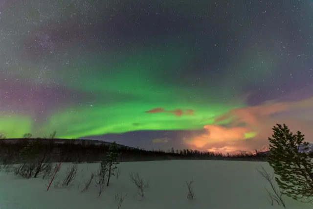 Northern lights in the Lyngenfjord Alps at the seventieth latitude